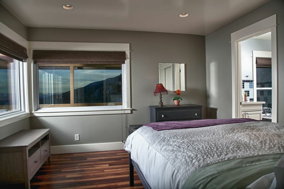 Photo of a small contemporary master bedroom in Phoenix with grey walls, medium hardwood flooring and no fireplace.