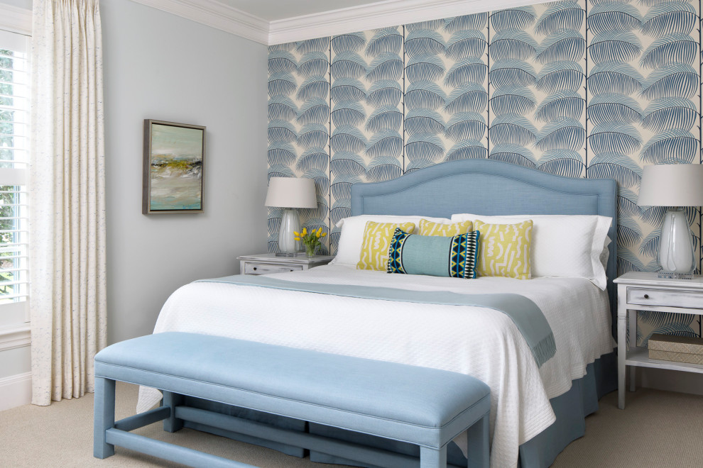 Beach style guest bedroom in Other with blue walls, carpet, no fireplace, beige floors and wallpapered walls.