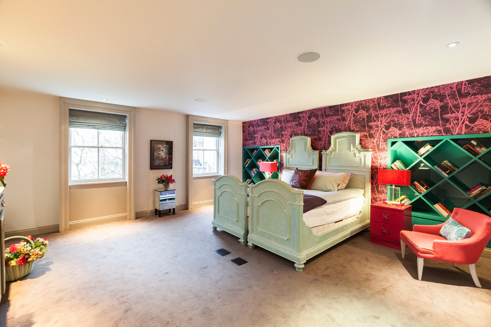 This is an example of a medium sized classic guest bedroom in London with pink walls and carpet.