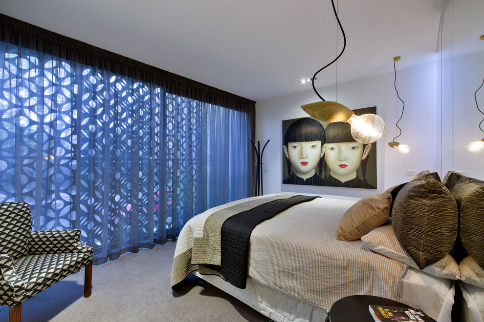 Example of a trendy master carpeted and gray floor bedroom design in Melbourne with white walls