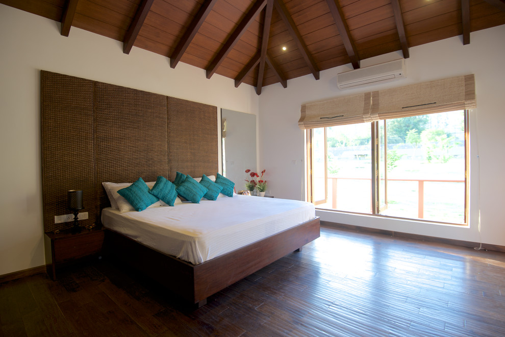 Design ideas for a world-inspired bedroom in Bengaluru.
