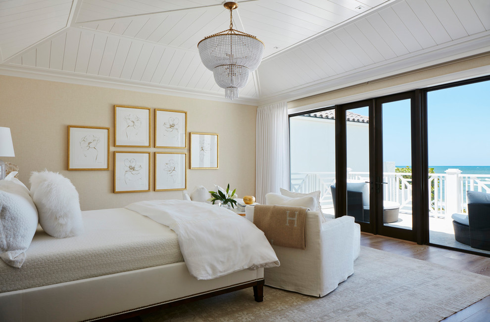 Coastal master bedroom in Miami with beige walls.