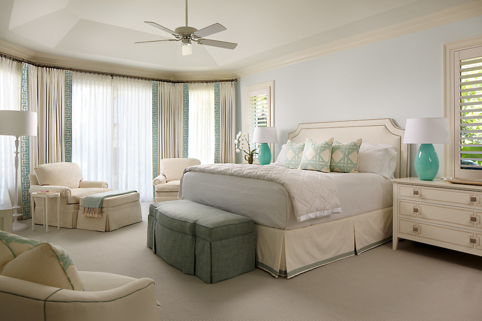 Inspiration for a large transitional master carpeted bedroom remodel in Miami with brown walls