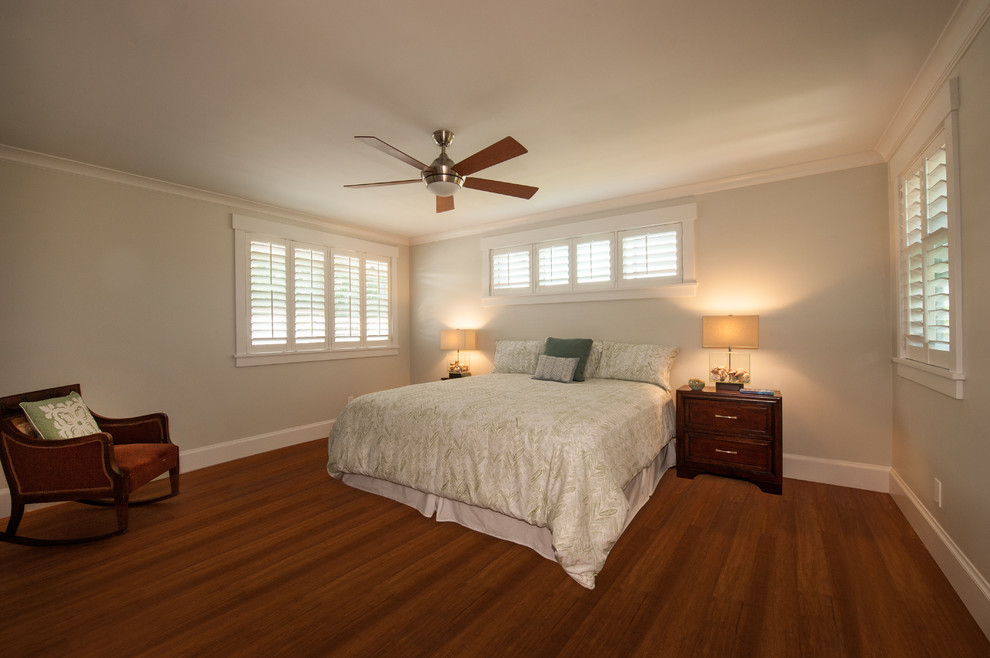 Example of an arts and crafts guest bamboo floor bedroom design in Hawaii