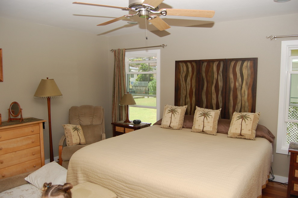 Example of a classic master bedroom design in Hawaii with beige walls