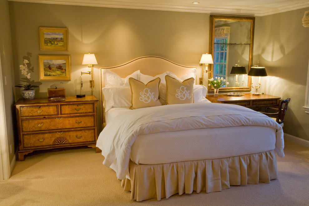 This is an example of a classic grey and silver bedroom in San Francisco with grey walls.