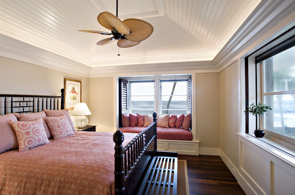 Inspiration for a tropical dark wood floor bedroom remodel in San Francisco with beige walls