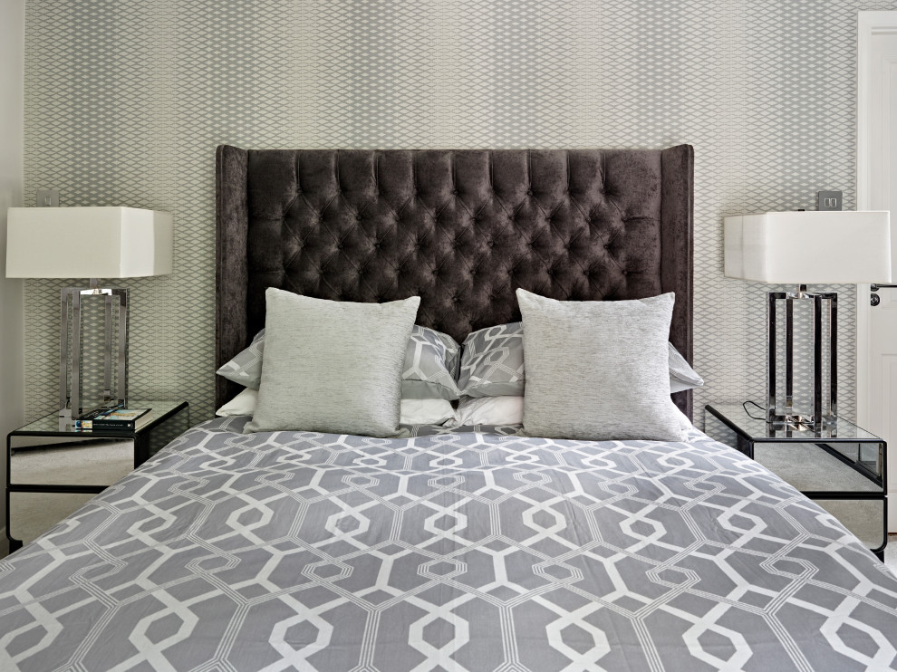 Small trendy master carpeted and gray floor bedroom photo in London with gray walls