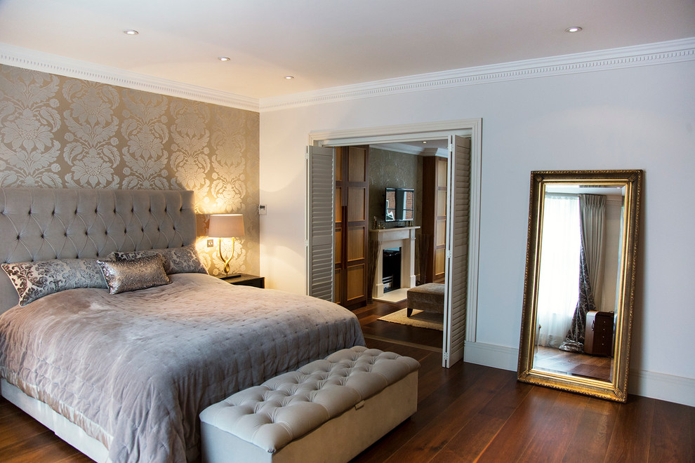 Inspiration for a large timeless master dark wood floor bedroom remodel in London with gray walls