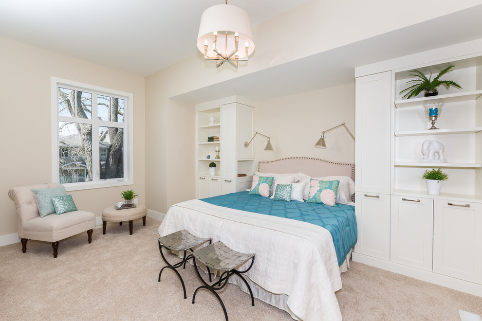 Inspiration for a large transitional master carpeted and beige floor bedroom remodel in Calgary with beige walls and no fireplace