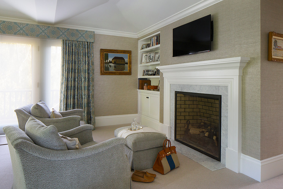 Inspiration for a large transitional master carpeted bedroom remodel in San Francisco with beige walls, a standard fireplace and a stone fireplace