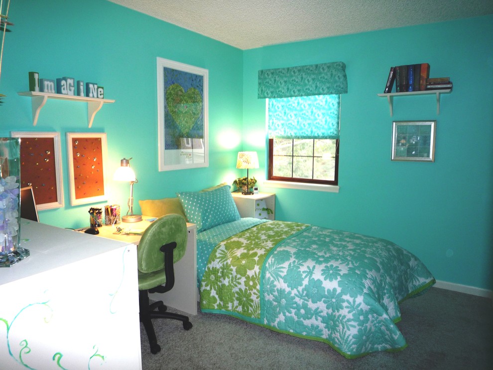 This is an example of a medium sized classic guest bedroom in Las Vegas with blue walls and carpet.