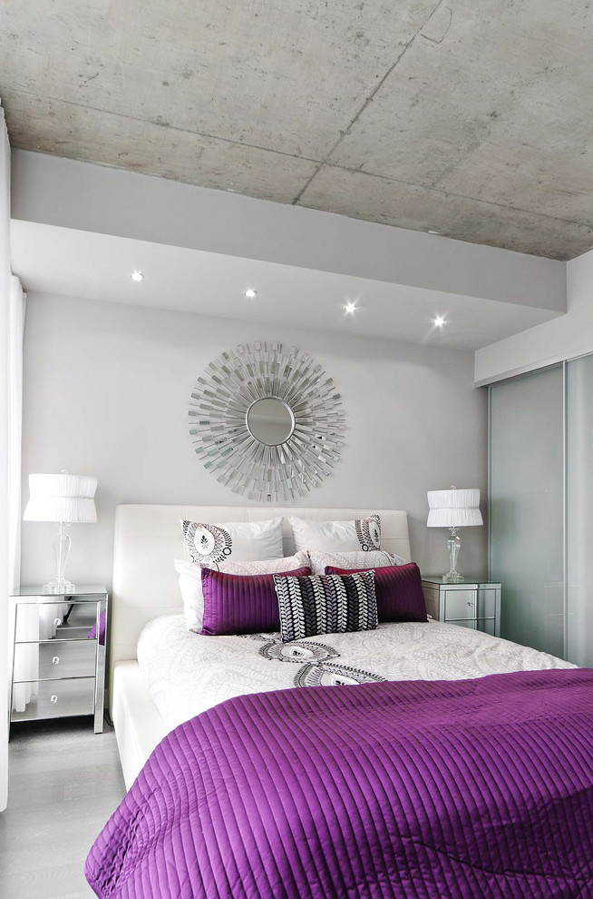 Design ideas for a contemporary grey and silver bedroom in Toronto.