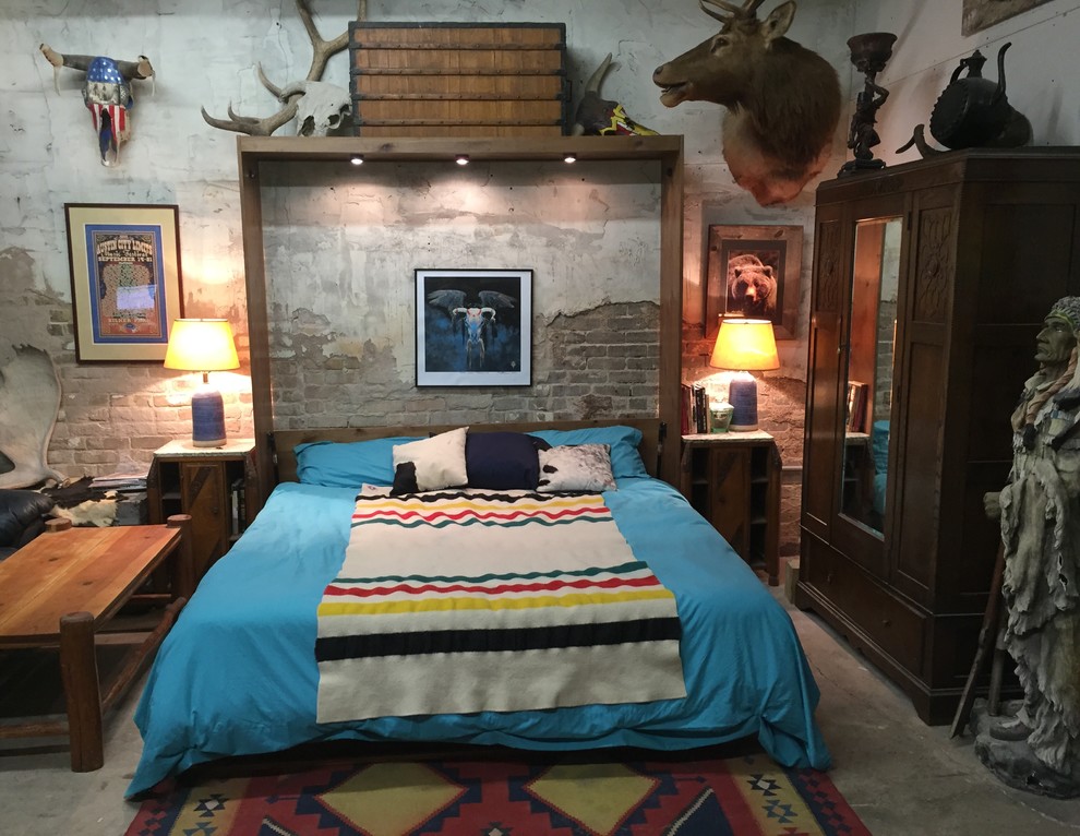 Bedroom - small rustic loft-style bedroom idea in Austin