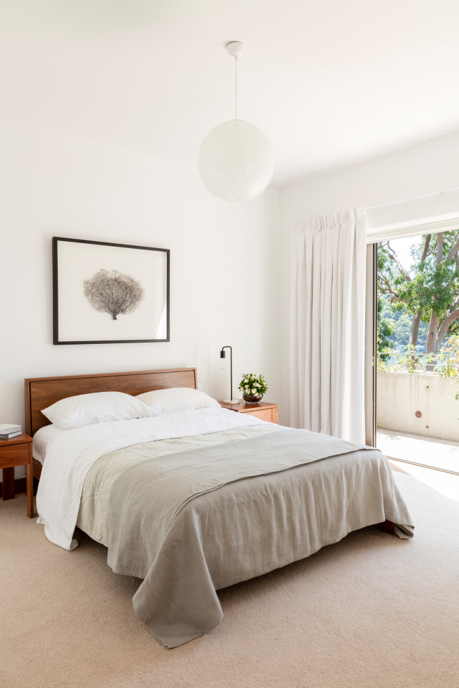Inspiration for a medium sized midcentury master bedroom in Sydney with white walls, carpet and beige floors.