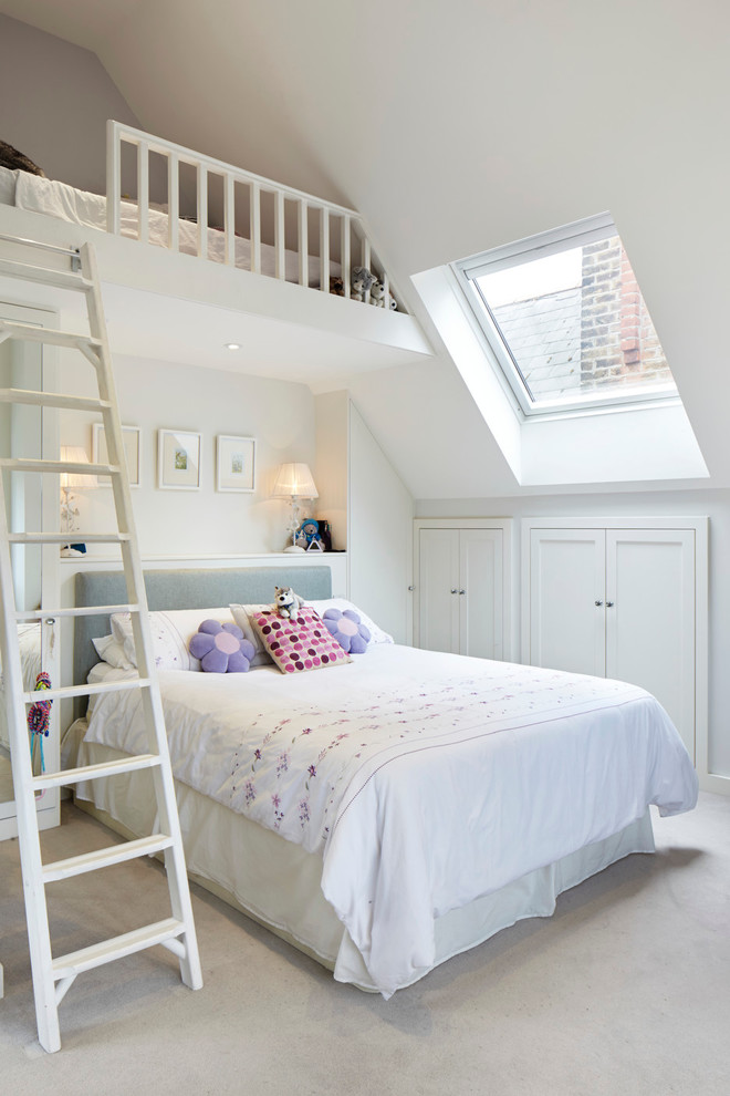 Elegant loft-style bedroom photo in London