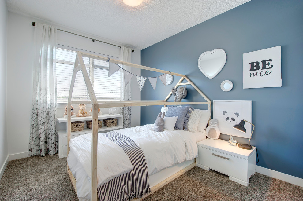 Photo of a medium sized classic guest bedroom in Edmonton with blue walls, carpet and brown floors.