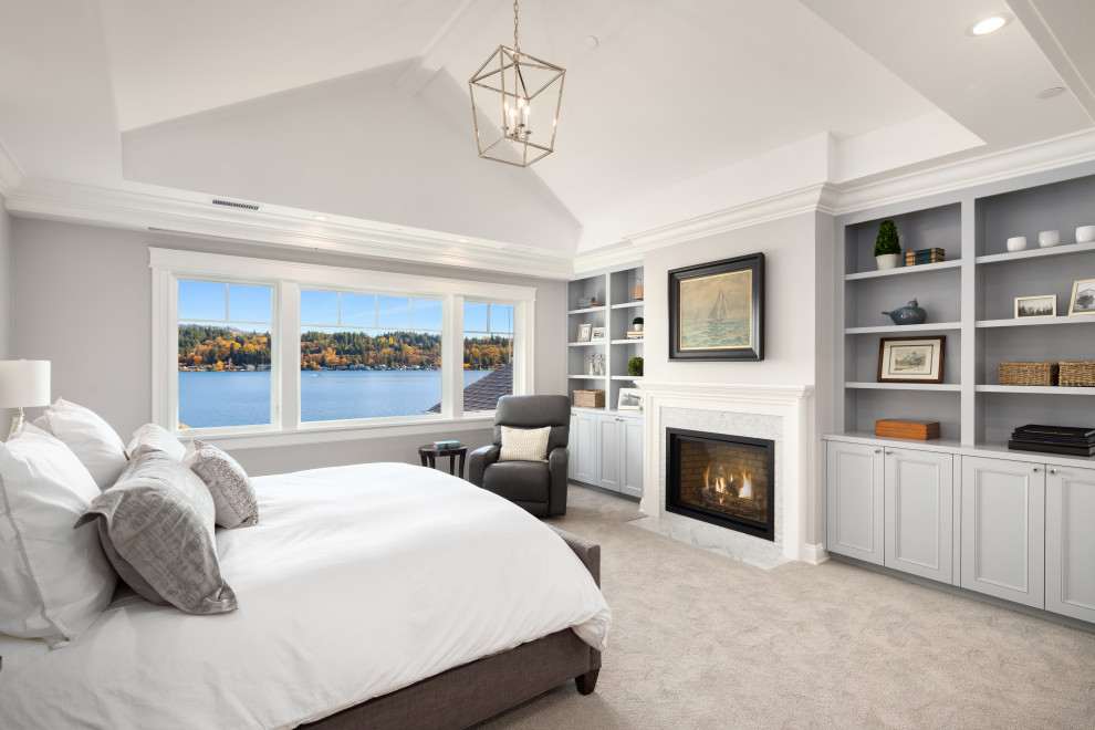 Classic bedroom in Seattle with grey walls, carpet, grey floors and a vaulted ceiling.