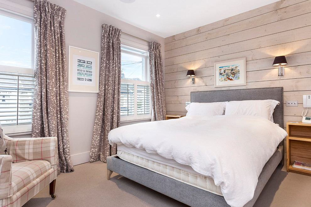 Klassisches Schlafzimmer mit grauer Wandfarbe und Teppichboden in London