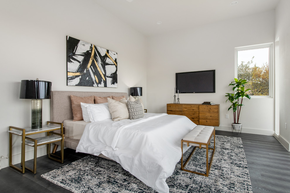 Example of a mid-sized 1960s master porcelain tile and gray floor bedroom design in Austin with white walls and no fireplace
