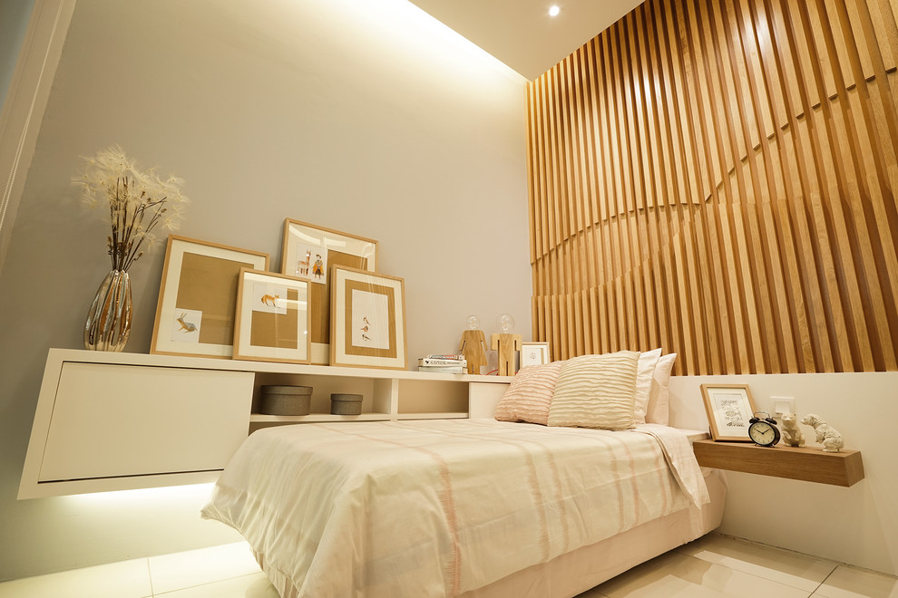 Пример оригинального дизайна: маленькая гостевая спальня (комната для гостей) в скандинавском стиле с серыми стенами и полом из керамогранита без камина для на участке и в саду