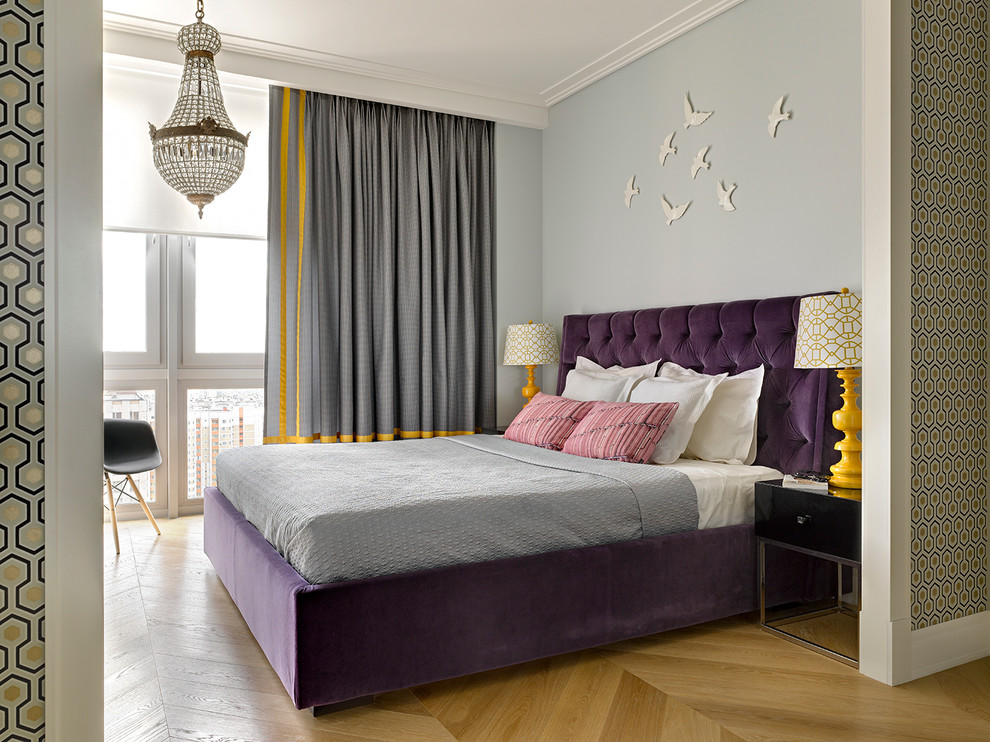 Eclectic master and grey and purple bedroom in Moscow with grey walls, light hardwood flooring and no fireplace.