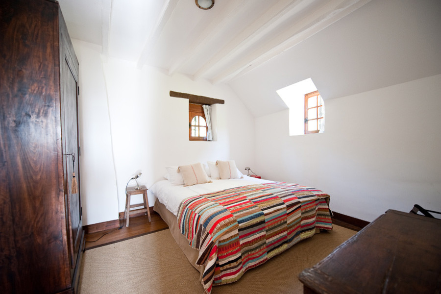 Inspiration for a rustic bedroom remodel in Dallas