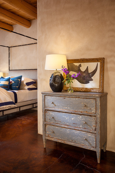 Medium sized guest bedroom in Albuquerque with beige walls, dark hardwood flooring and no fireplace.