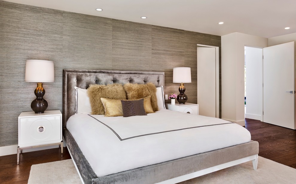 Inspiration for a large contemporary master medium tone wood floor bedroom remodel in Orange County with gray walls