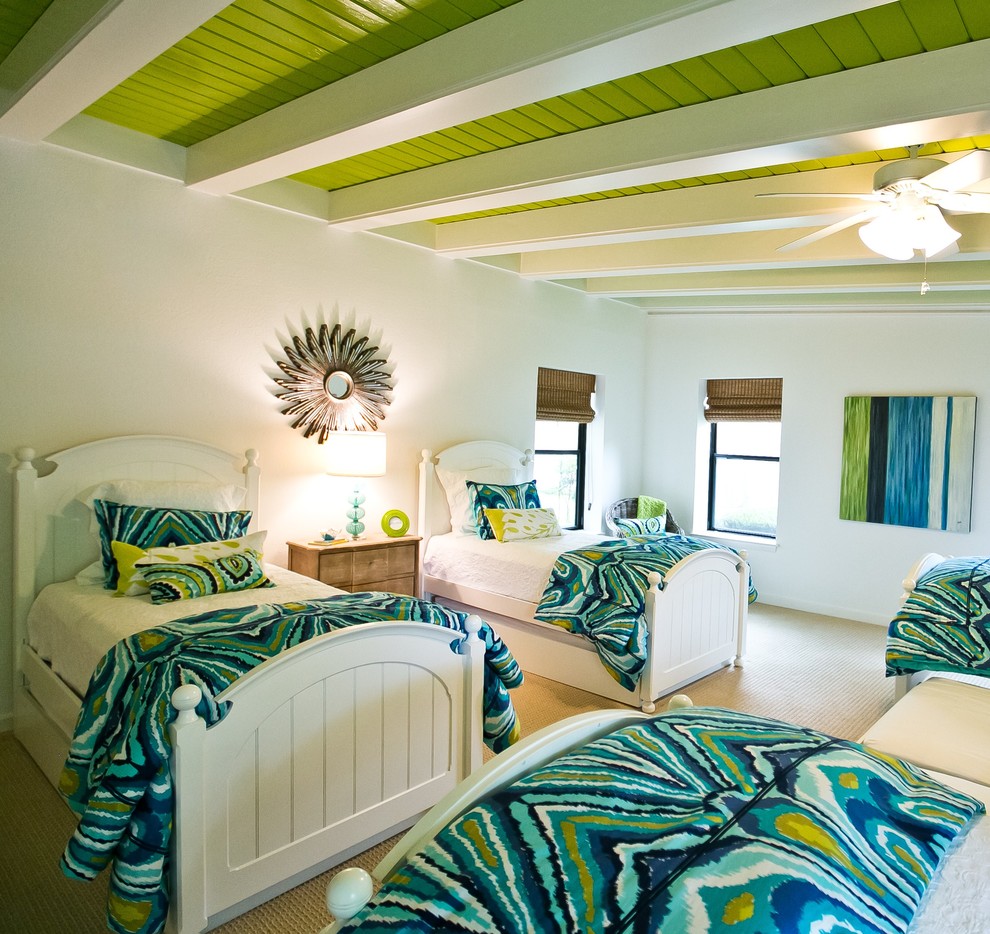 Beach style bedroom in Austin with white walls.
