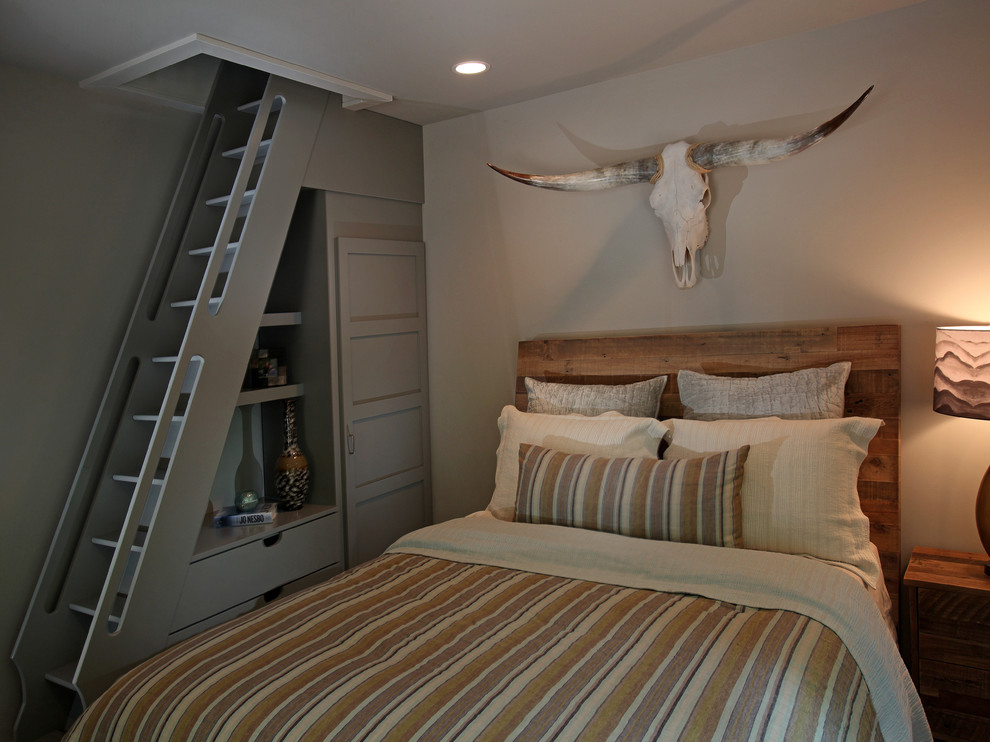 Medium sized rustic guest bedroom in Atlanta with beige walls and carpet.