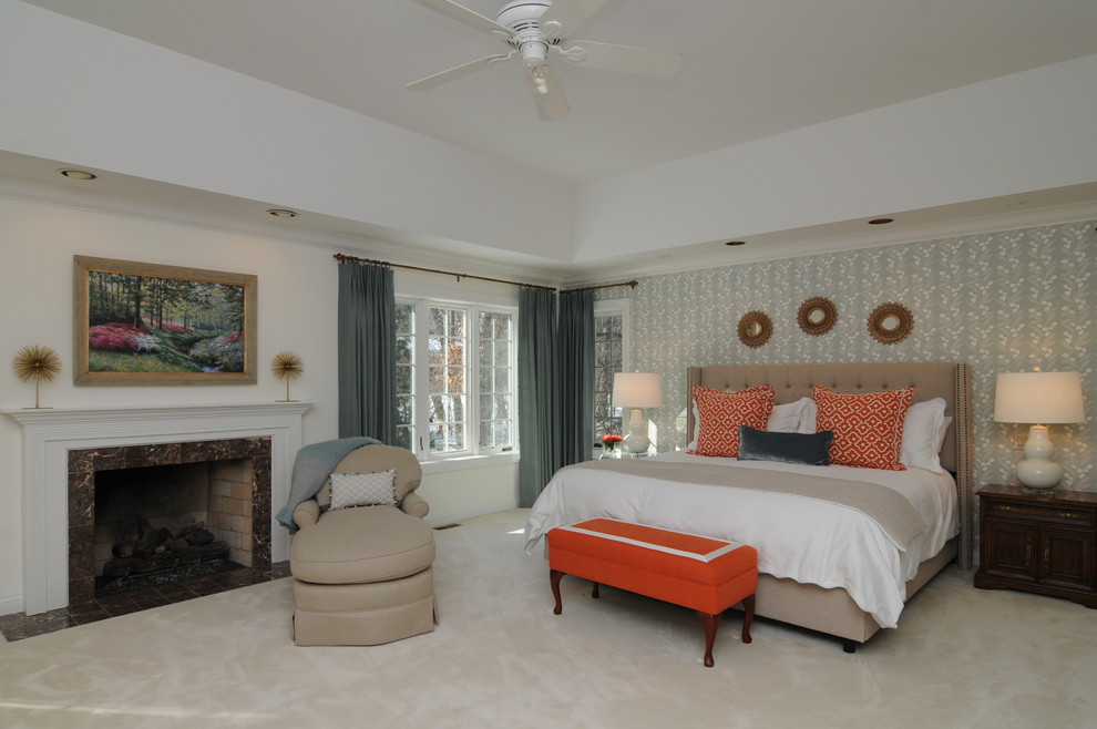 Inspiration for a medium sized traditional master bedroom in Vancouver with white walls, carpet, a standard fireplace and a stone fireplace surround.