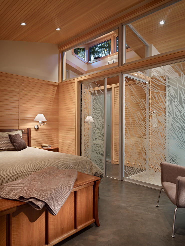Bedroom - mid-sized mid-century modern master concrete floor bedroom idea in Seattle