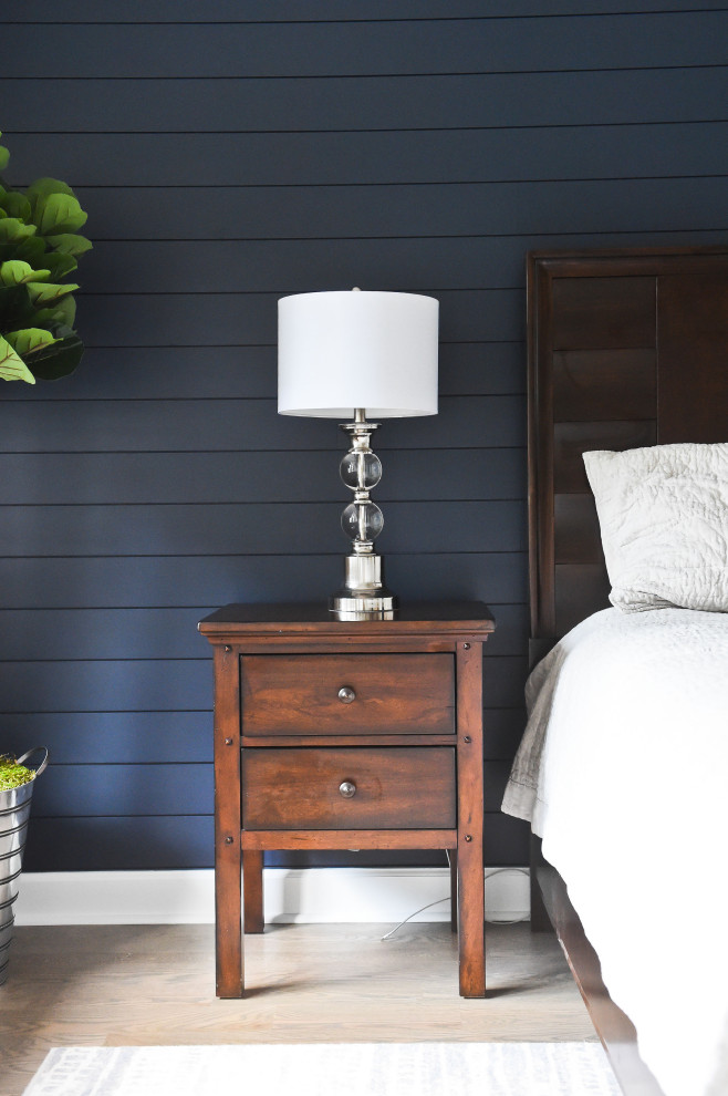Transitional master shiplap wall bedroom photo in Charlotte with blue walls