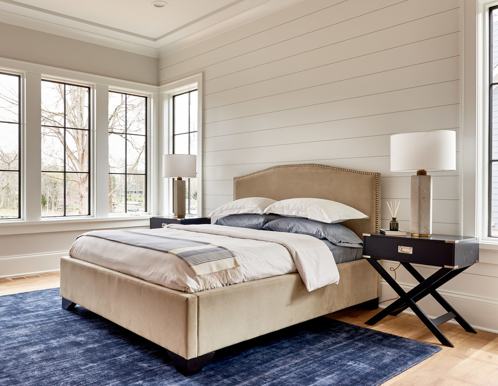 Inspiration for a country master bedroom in Birmingham with white walls.