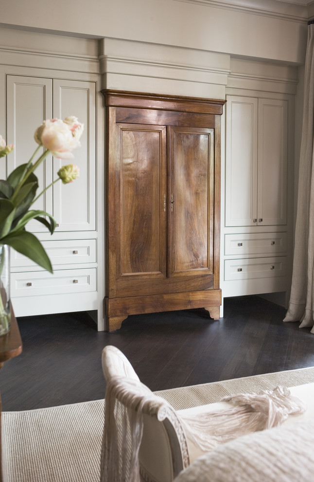 Inspiration for a large transitional dark wood floor bedroom remodel in Other with gray walls