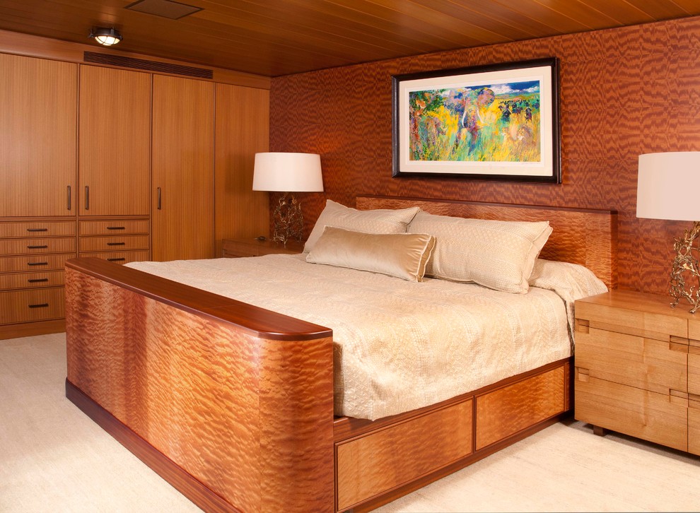Immagine di una camera da letto design con moquette
