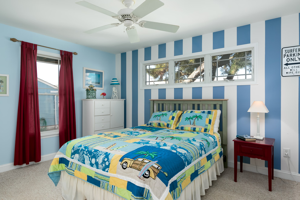 Mid-sized beach style guest carpeted and beige floor bedroom photo in Philadelphia with blue walls and no fireplace