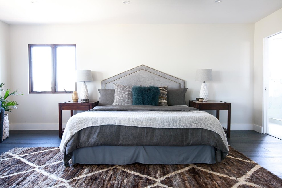 Trendy master dark wood floor bedroom photo in Los Angeles with white walls and no fireplace