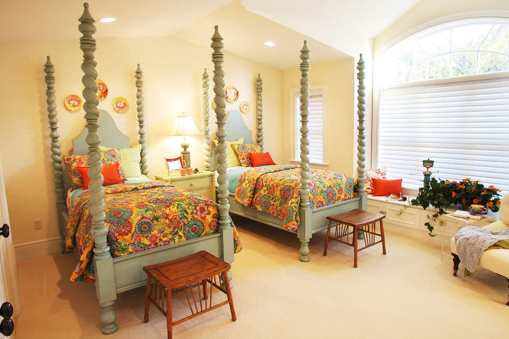 This is an example of a traditional guest bedroom in Milwaukee with yellow walls and carpet.