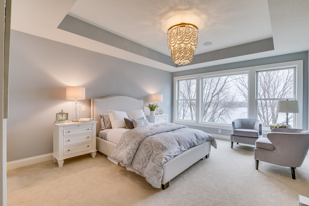 Design ideas for a large farmhouse master bedroom in Minneapolis with grey walls, carpet and white floors.