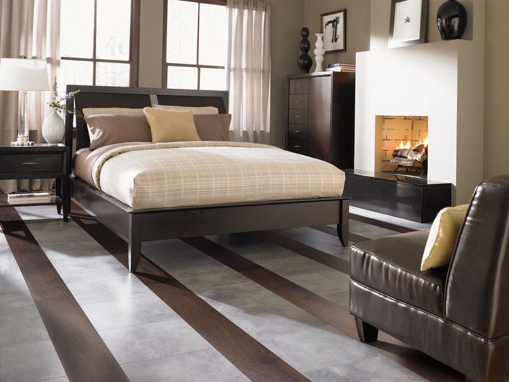 Mid-sized elegant guest dark wood floor bedroom photo in Minneapolis with beige walls and a standard fireplace
