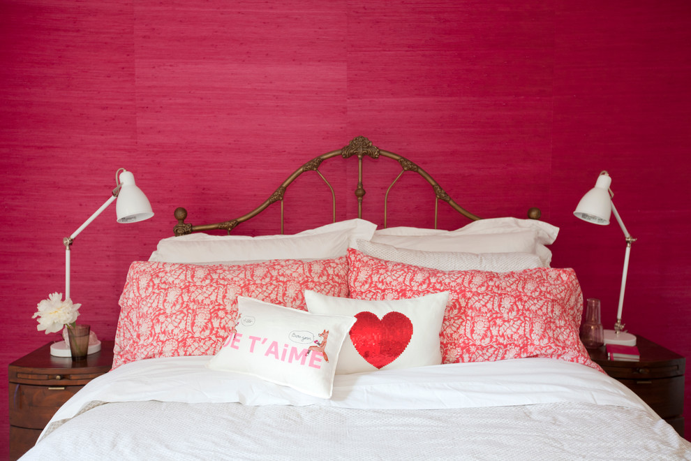 Design ideas for an eclectic bedroom in Vancouver with pink walls.
