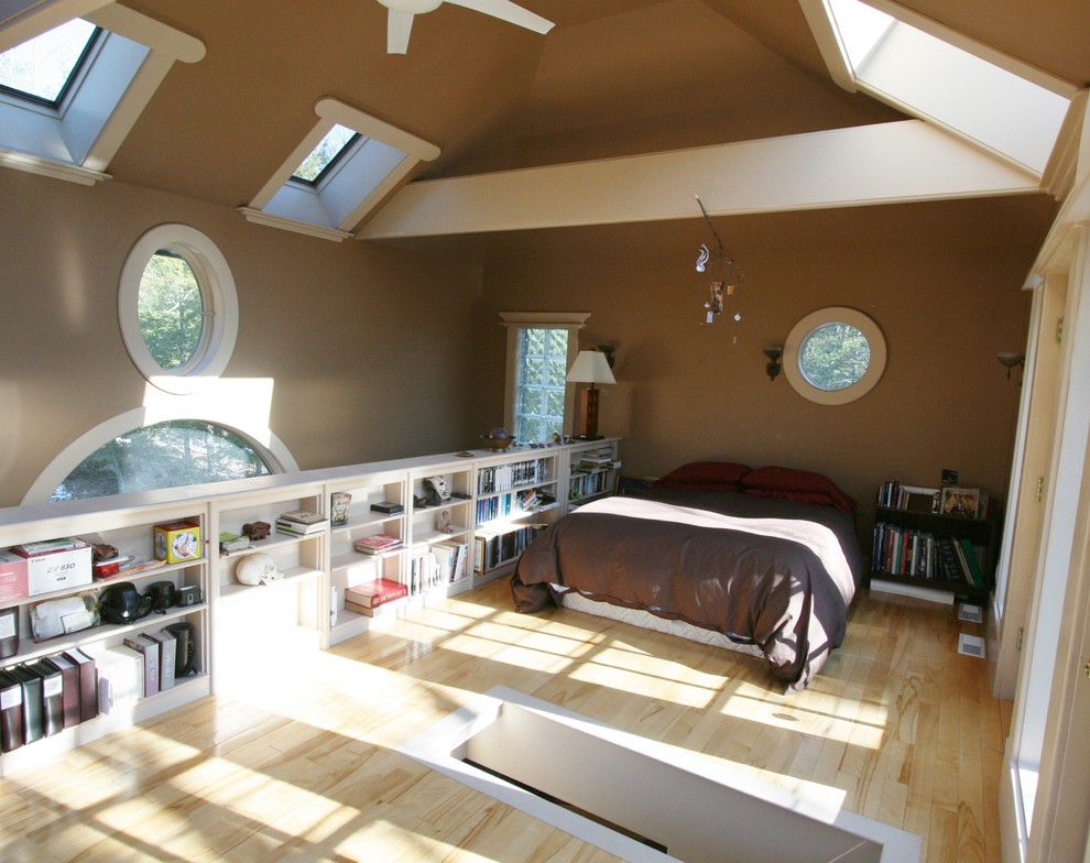 Bedroom - mid-sized transitional guest light wood floor and beige floor bedroom idea in New York with beige walls
