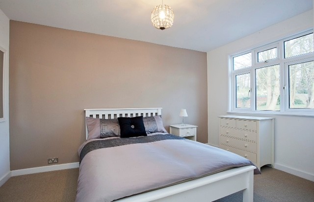 This is an example of a modern bedroom in Berkshire.