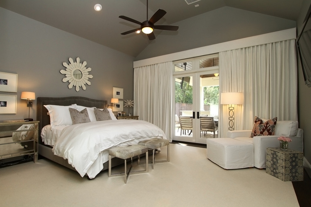 Inspiration for a large classic master bedroom in Houston with grey walls and dark hardwood flooring.