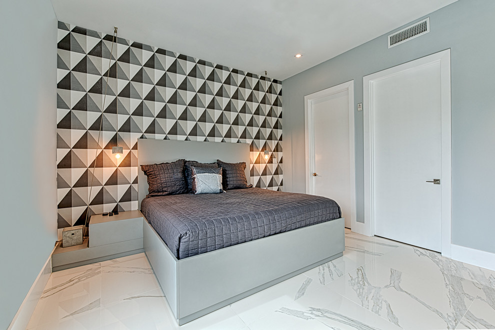 Medium sized contemporary master bedroom in Miami with grey walls and marble flooring.