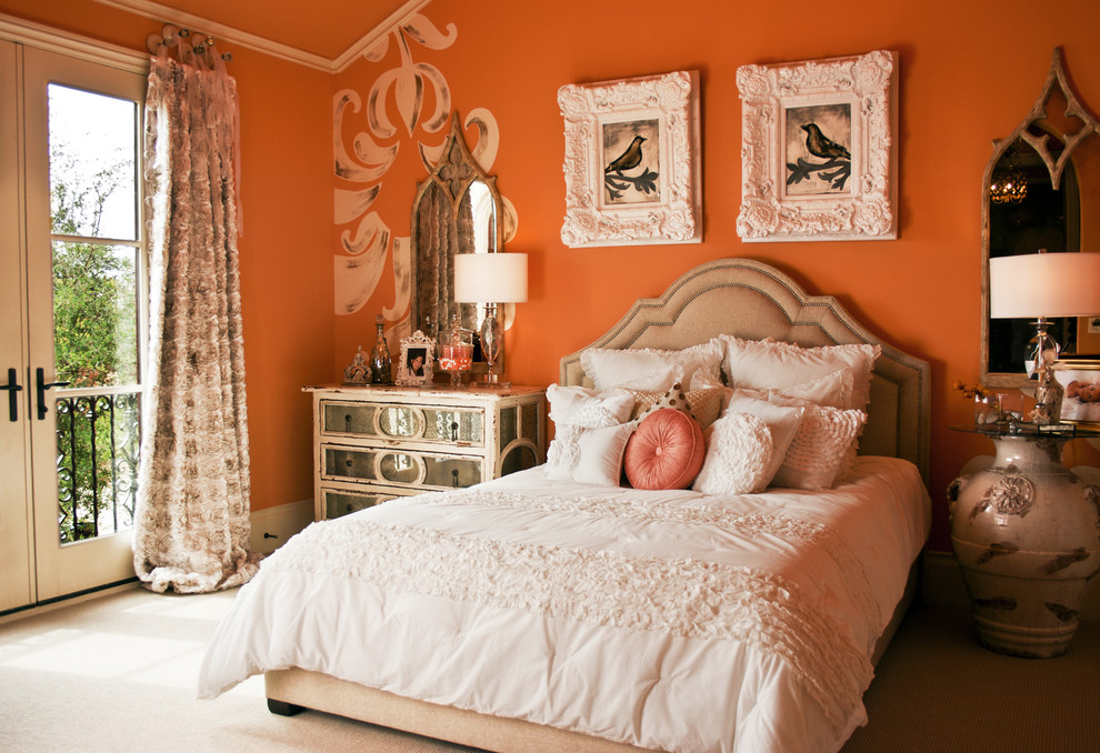 Inspiration for a shabby-chic style bedroom remodel in Dallas with orange walls