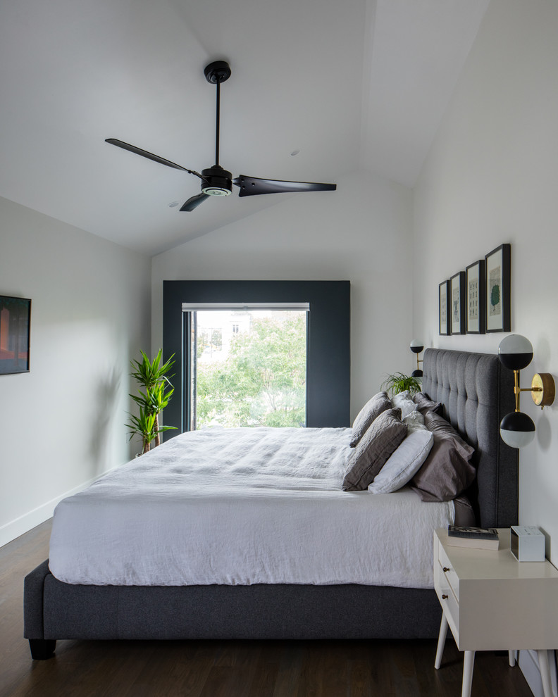 Inspiration for a mid-sized modern master medium tone wood floor and gray floor bedroom remodel in Denver with white walls