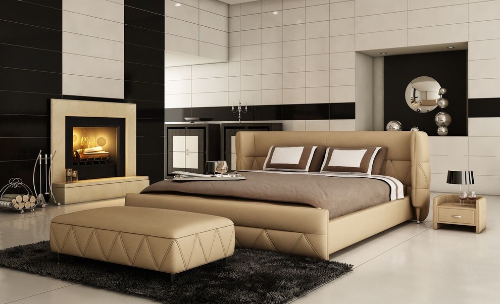 Modelo de dormitorio principal minimalista grande con paredes blancas, todas las chimeneas, marco de chimenea de metal, suelo de cemento y suelo gris